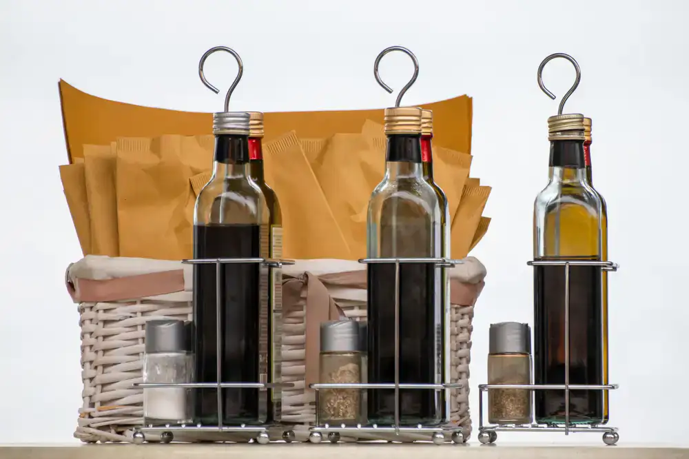 Glass bottles filled with natural unfiltered olive oil