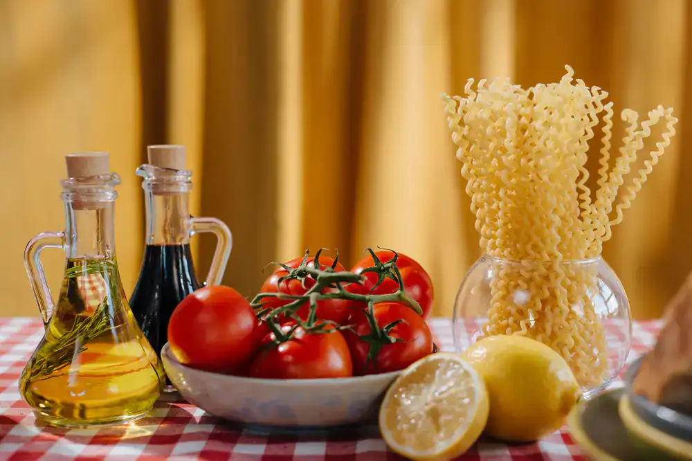 Bottles of premium olive oil on a sunlit table